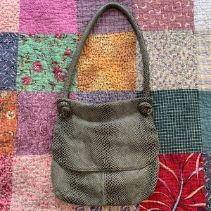 Studio imports funky soft faux alligator sack